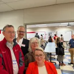 Joel Johnson, Aaron Wilson, Michele Cook and Charmaine Koch smiling.