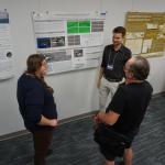 People talking during poster session.