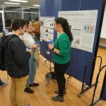 People talking during poster session.