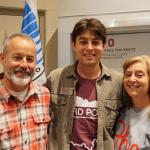 Three people smiling in front of The Ohio State University and Byrd Polar and Climate Research Center banners.